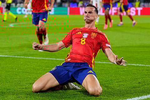 Fabian Ruiz celebrates after scoring Spain's second goal